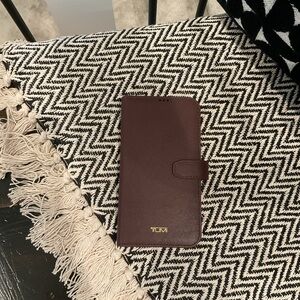 TUMI iPhone 13 ProMax case wallet. Like new never used.